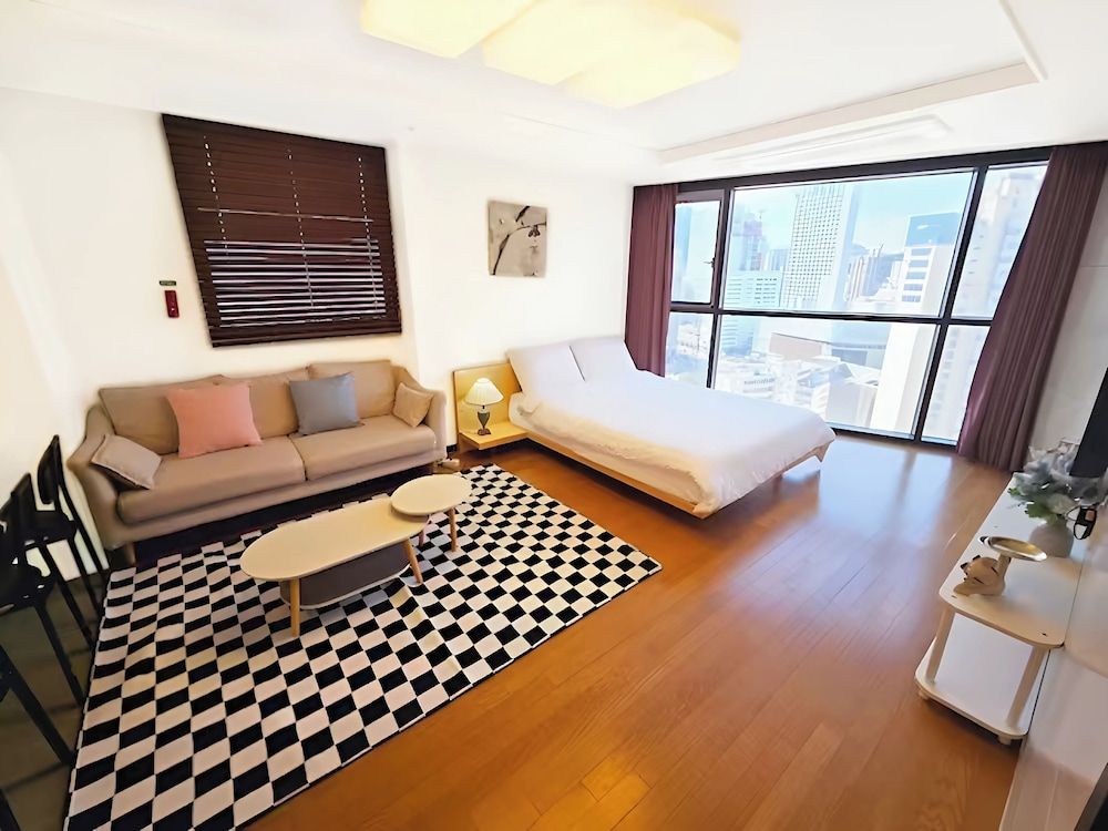 HOTEL WITH Premium Apartment (Bed&View randomly assigned,Extra futon does NOT included in the extra person fee) 14