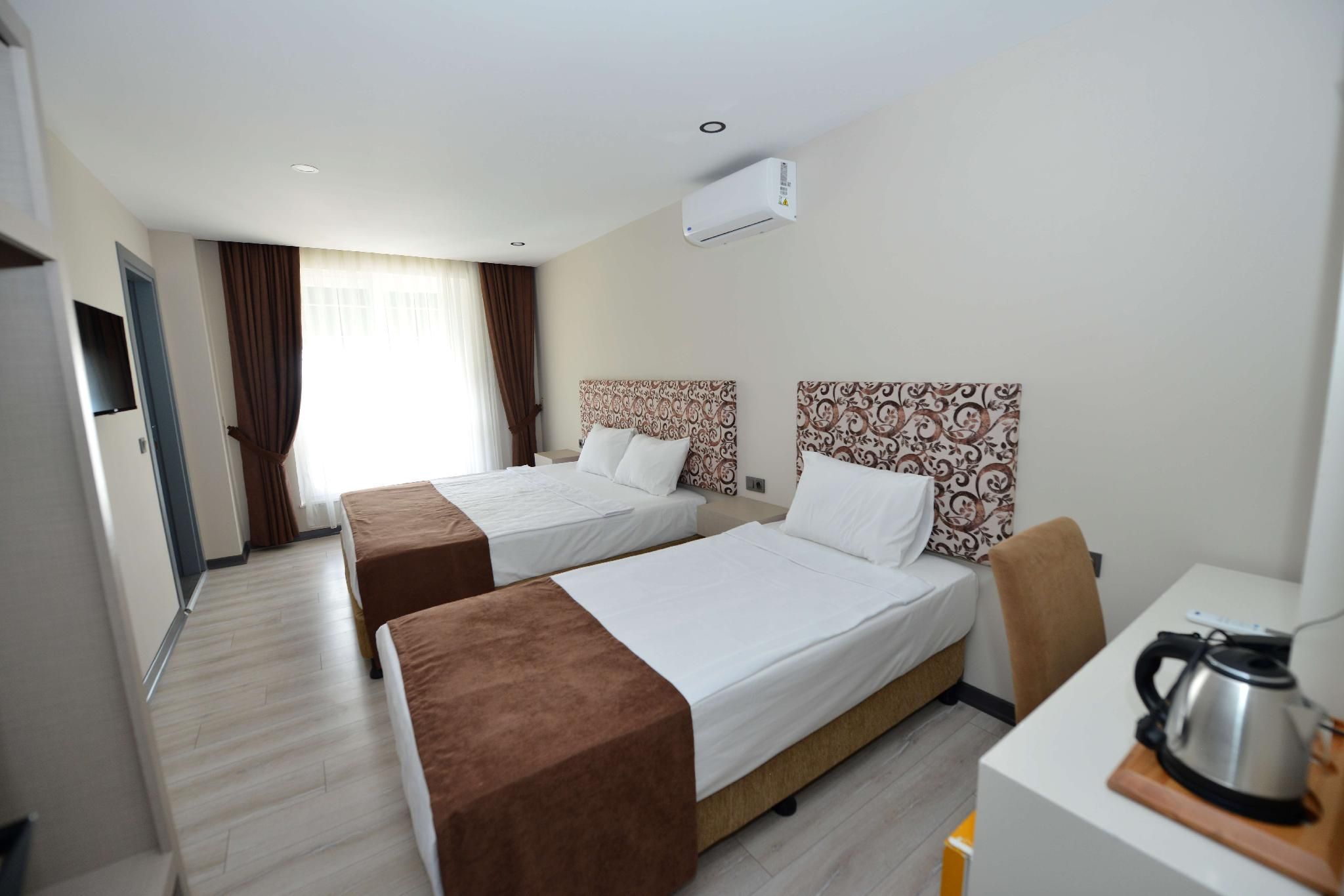 Triple Room - 1 Double Bed and 1 Single Bed