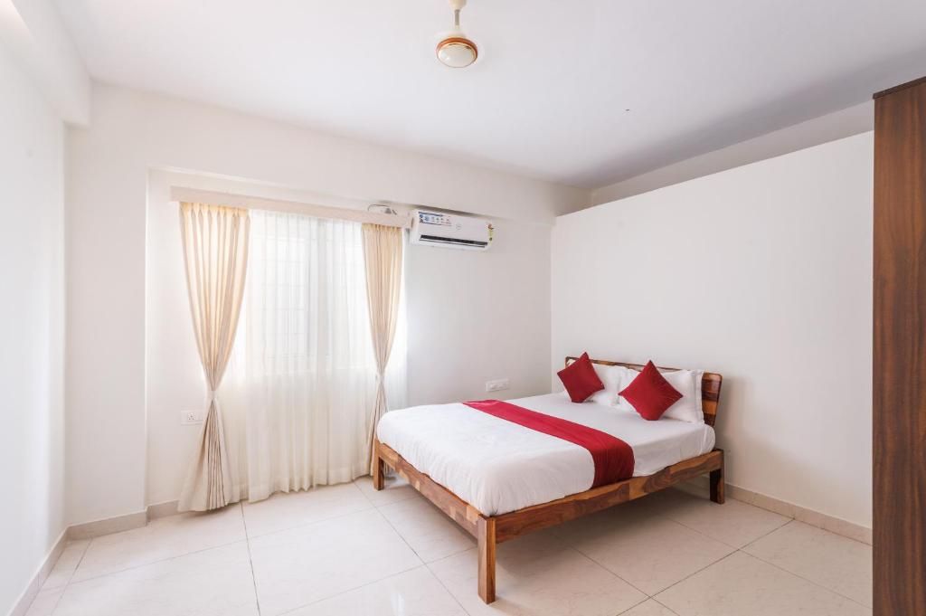 Bright and airy bedroom with a comfortable bed and professional lighting.