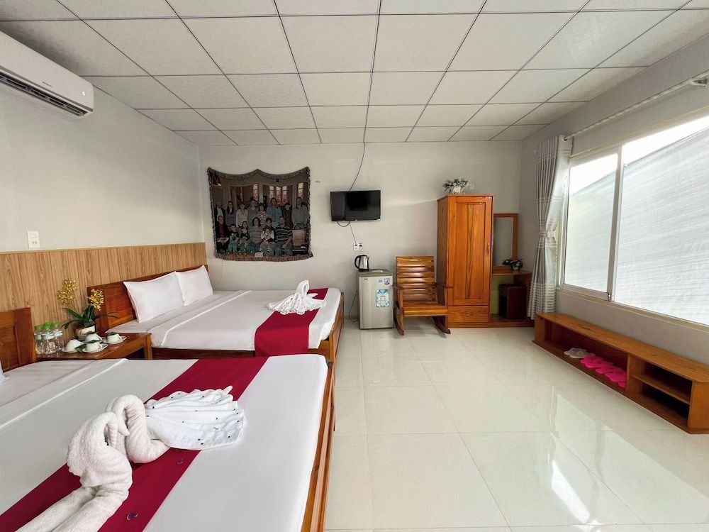 Sea Breeze Resort & Spa Executive Quadruple Room, Garden View 9