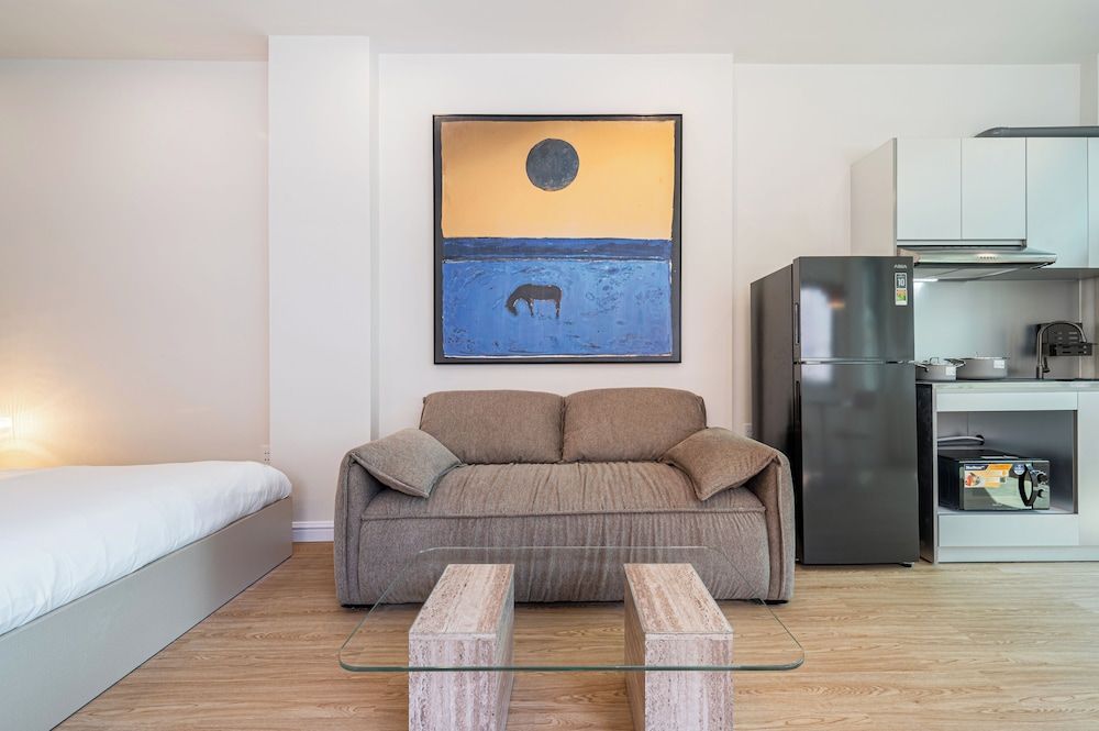 Home by CR Concept in The Center Signature Studio Suite, 1 King Bed with Sofa bed 16