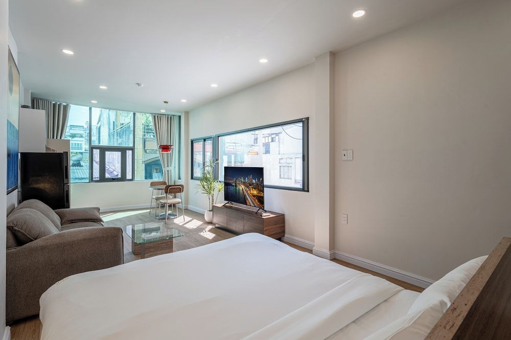 Home by CR Concept in The Center Signature Studio Suite, 1 King Bed with Sofa bed 5