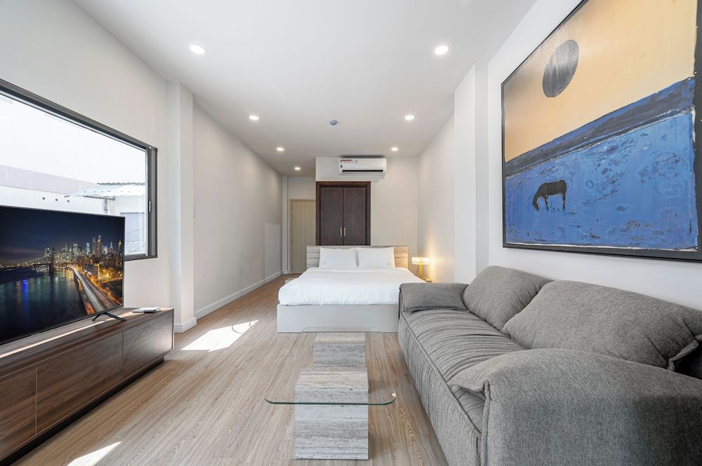 Home by CR Concept in The Center Signature Studio Suite, 1 King Bed with Sofa bed 4