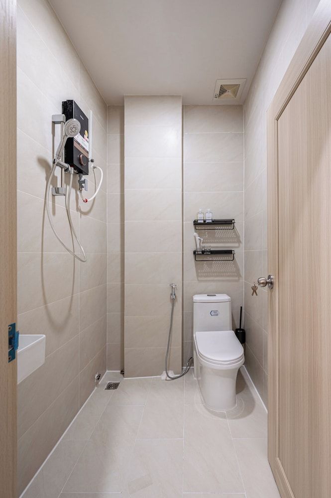 Home by CR Concept in The Center Signature Studio Suite, 1 King Bed with Sofa bed 10