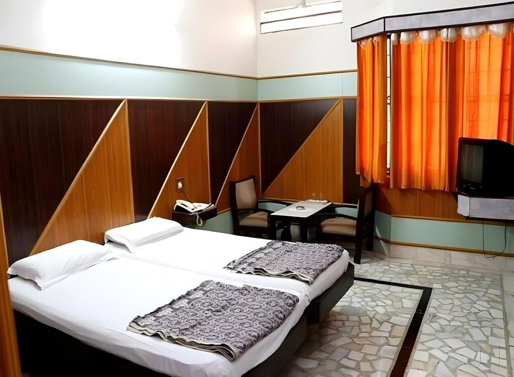 Ashoka Comforts Standard Room 4