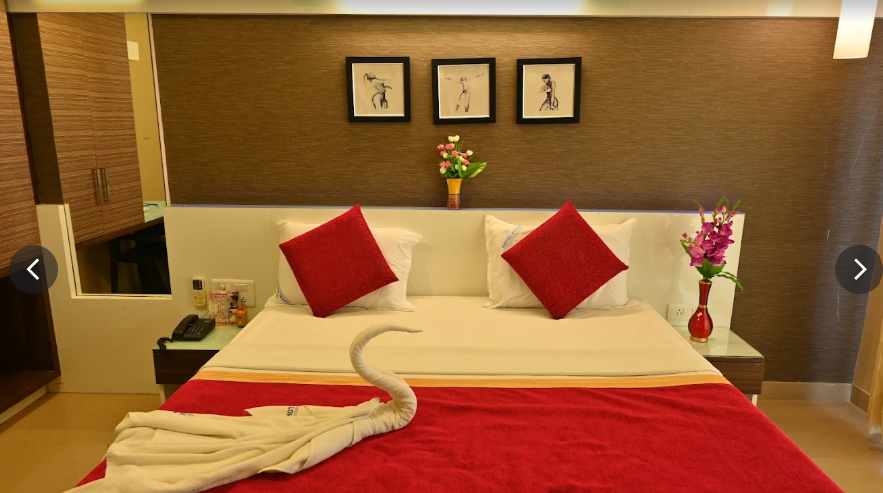 Hotel Pooja International Super Deluxe Room AC 2