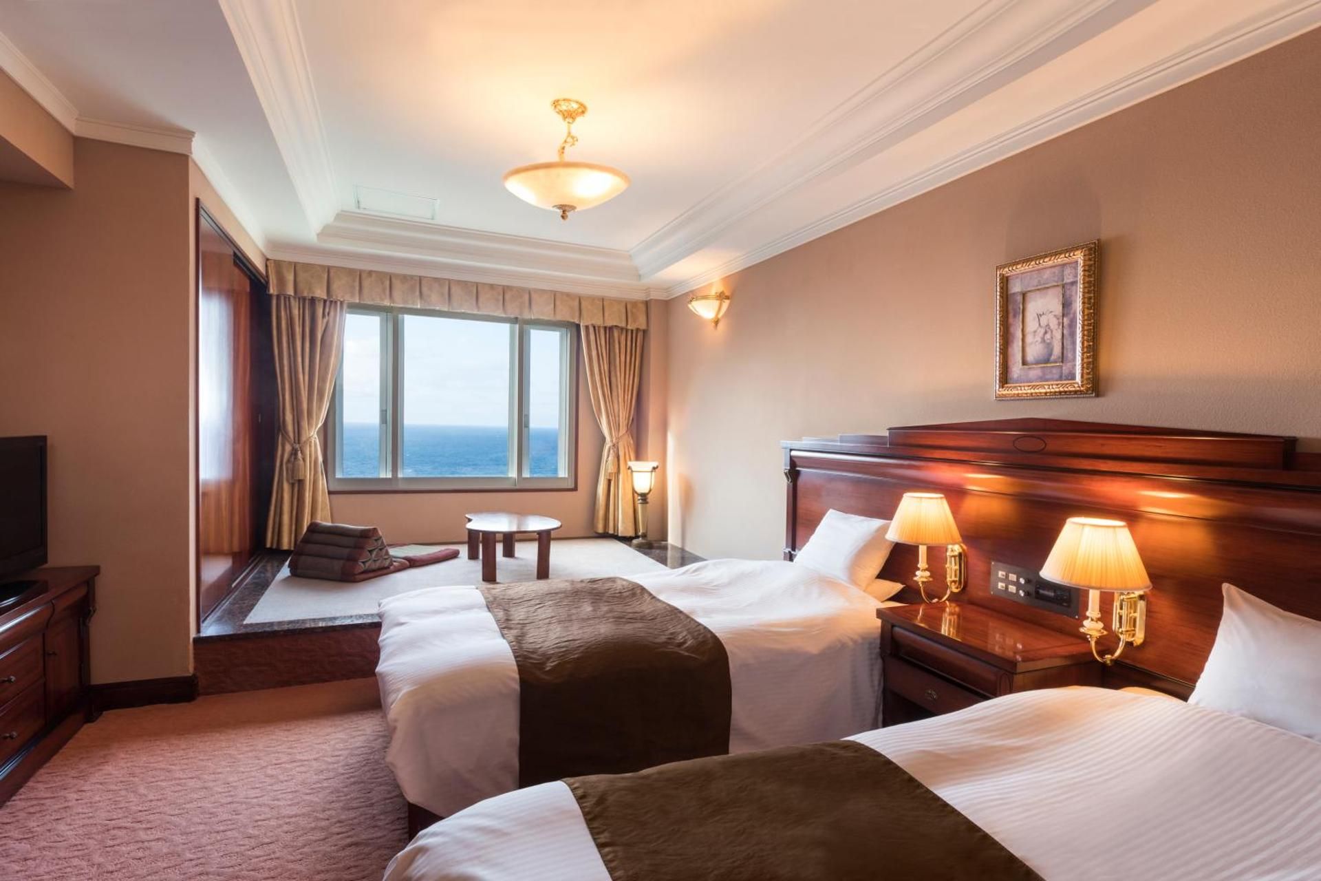 Room with Carpeted area, Open Air Bath and Partial Ocean View- Non-Smoking 