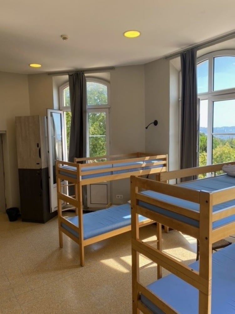 Bed in 8-Bed Male Dormitory - Shared Bathroom