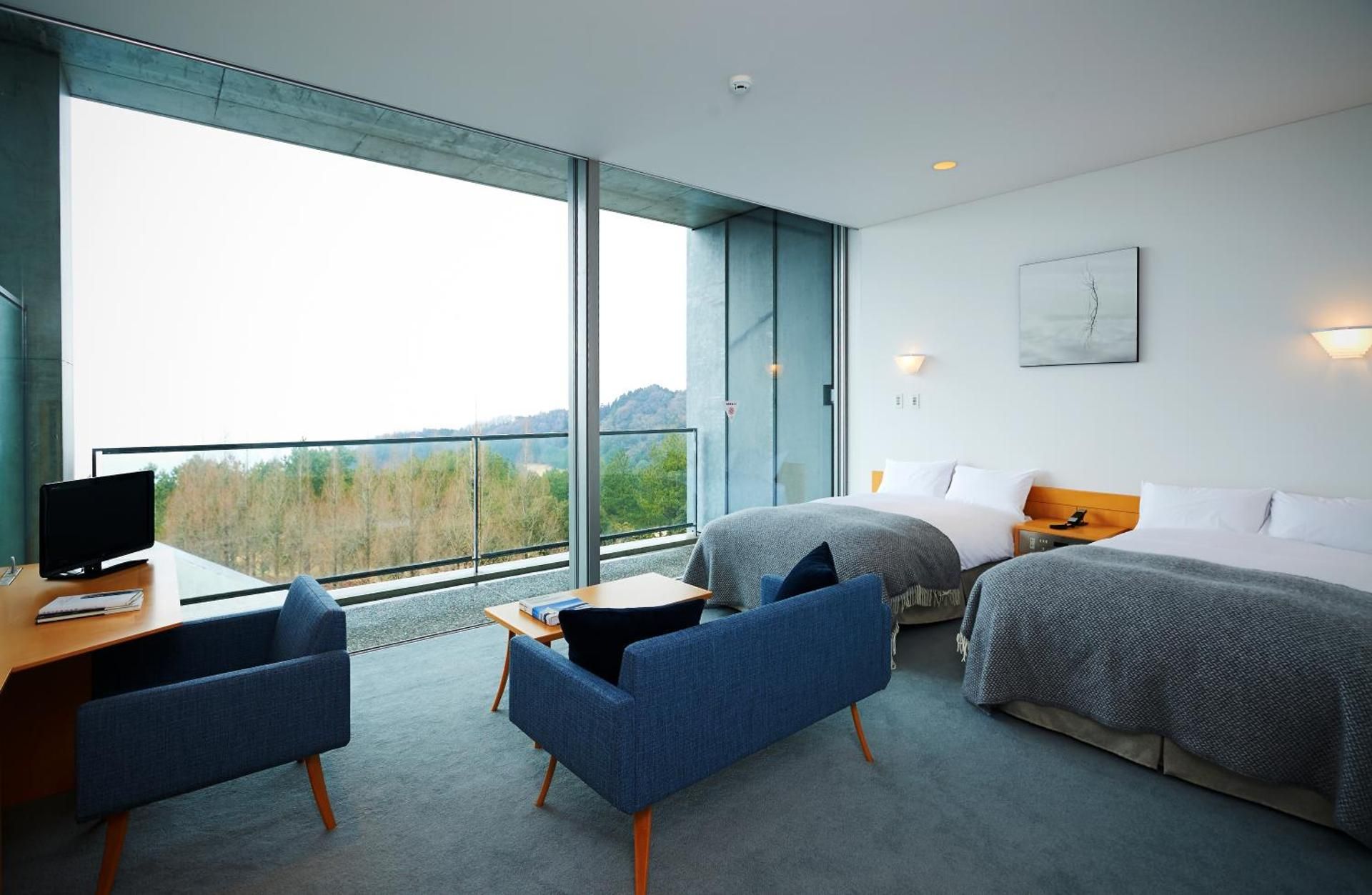 Two-Bedroom Suite with Extra Bed and Ocean View