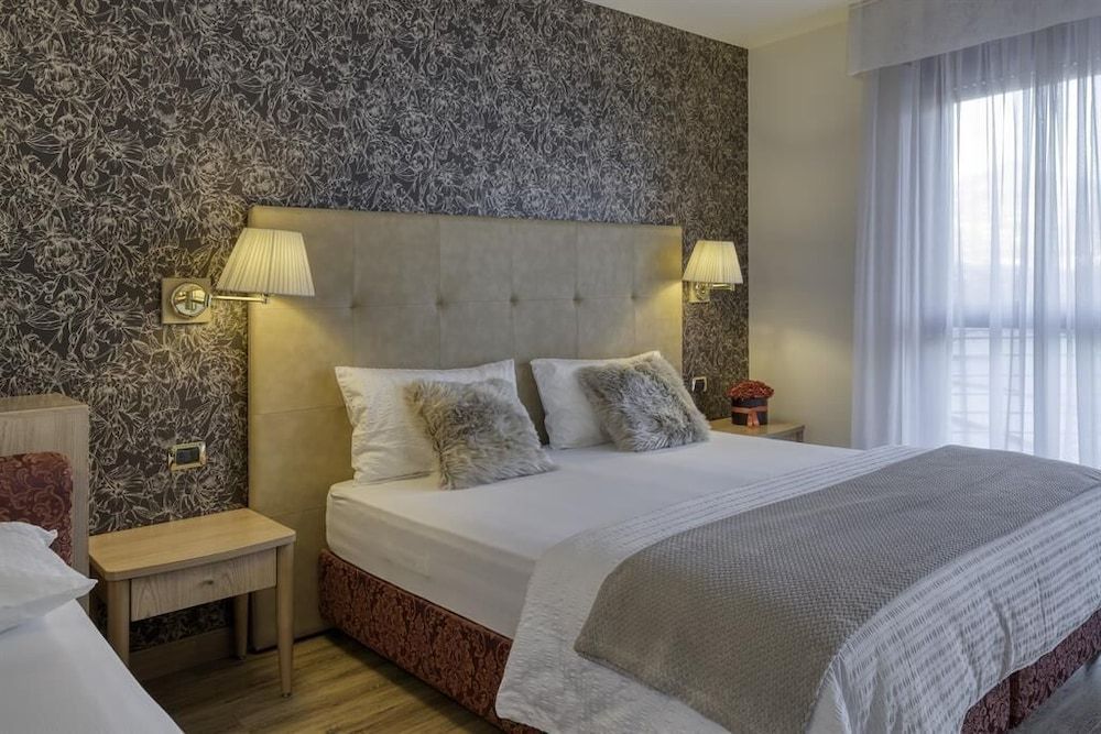 Hotel Sporting Trento Quadruple Room 3