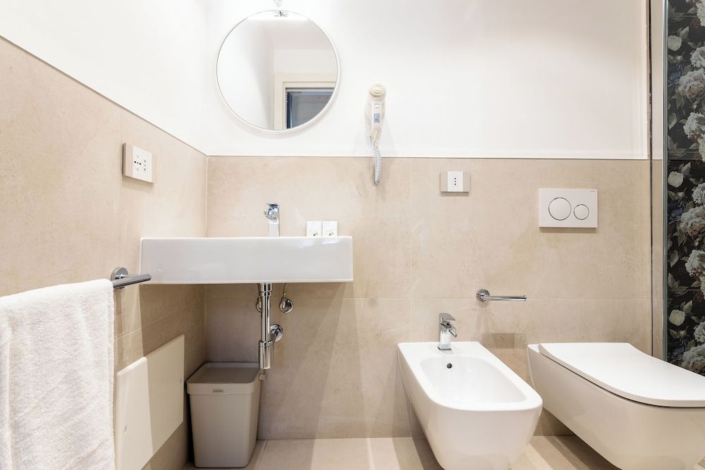 Magnini Rooms Family Triple Room 6