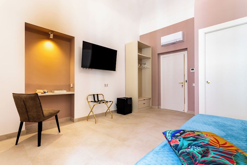 Magnini Rooms Family Triple Room 7