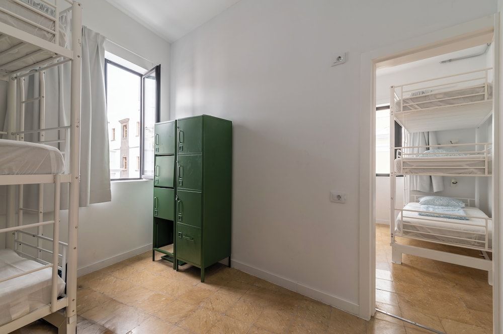 One Single Bed in a 12 beds room