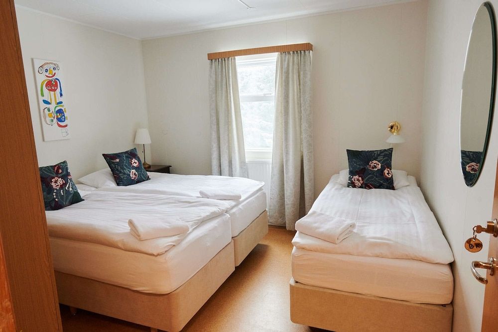 Economy Triple Room, Non Smoking, Shared Bathroom