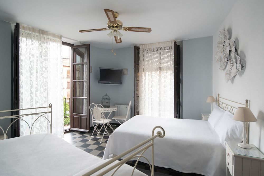Triple Room, Private Bathroom (outdoor balcony to Plaza Nueva)