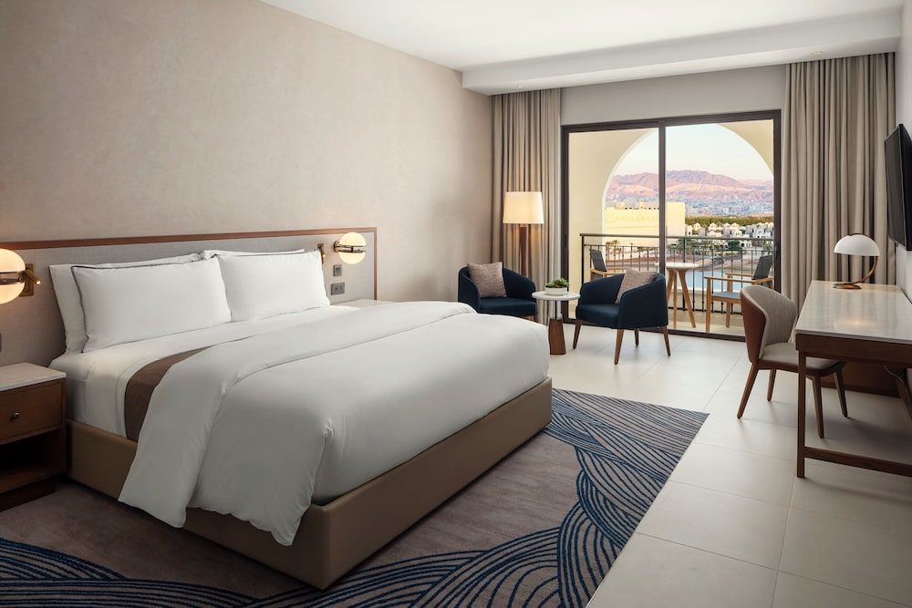 Suite, 1 King Bed, Balcony, Pool View