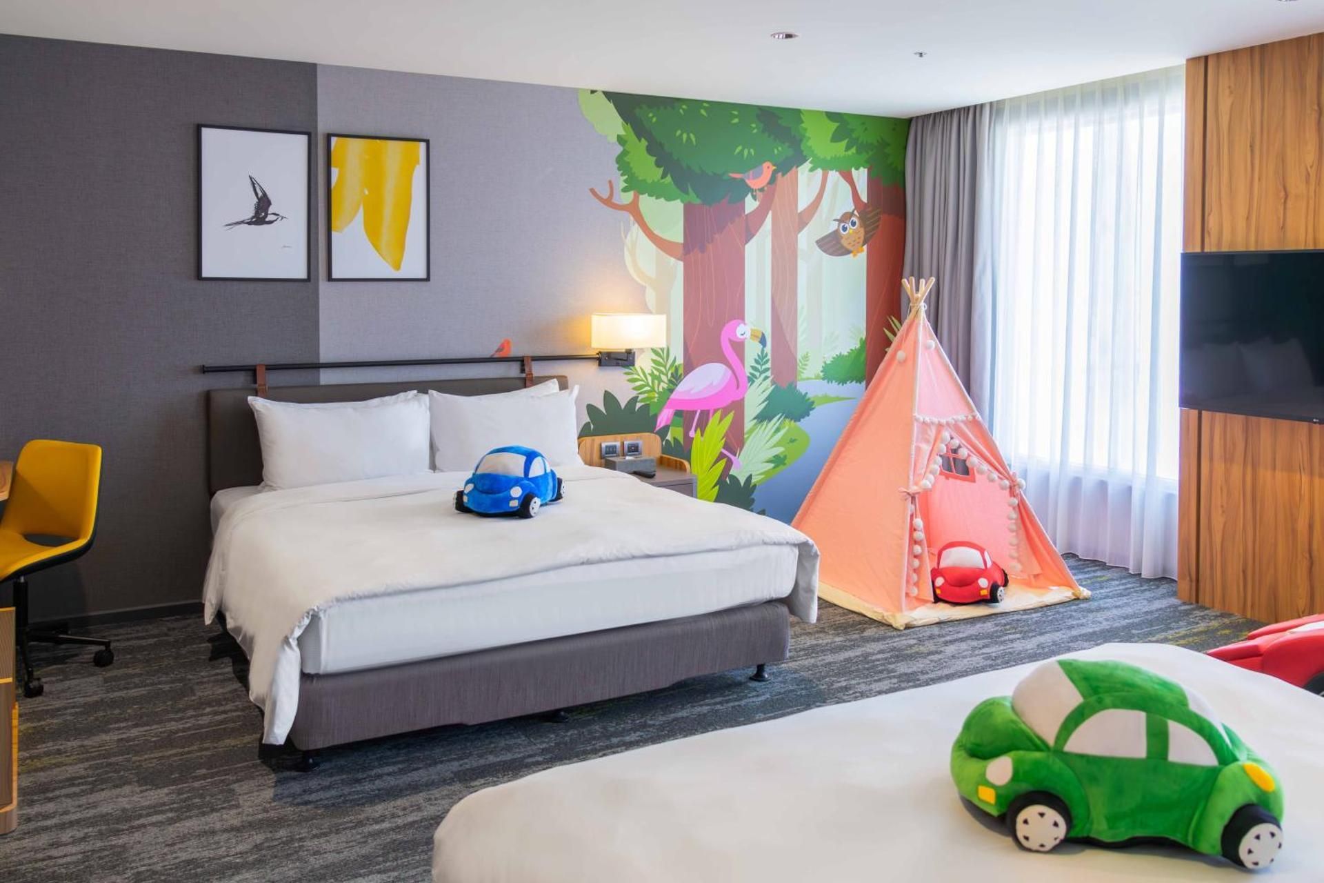 Grand Room with Two King Beds and One Twin Bed - Kids Theme