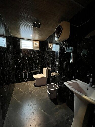 Deluxe Cottage King Bed with Home Theater and Bug Bed Forest View