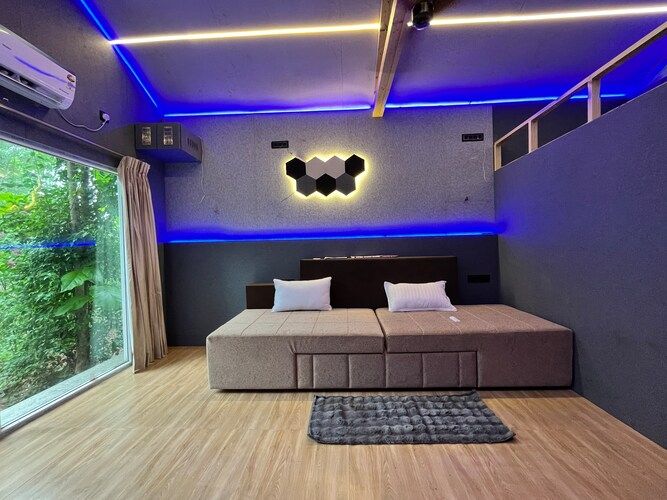 Deluxe Cottage King Bed with Home Theater and Bug Bed Forest View