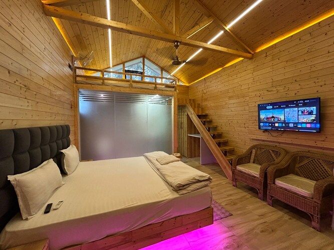 The Urban Escape (By Saubhagya Mangalam) Deluxe Pinewood Cottage King Bed with Bug Bed Forest View 2