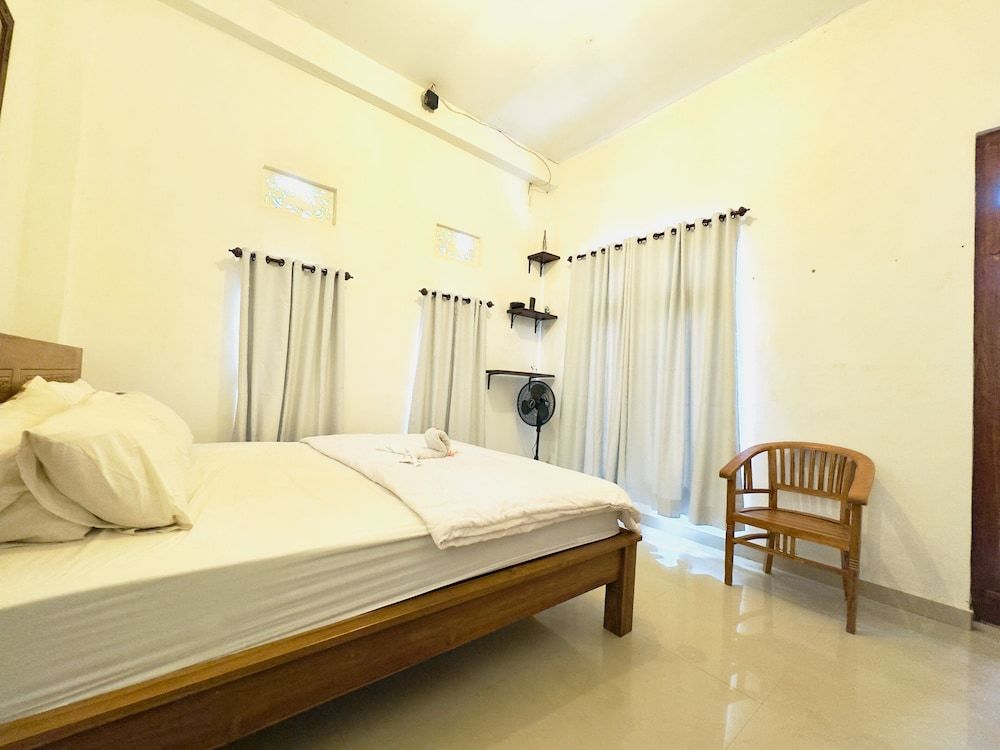 Standard Double Room, Balcony, Garden View