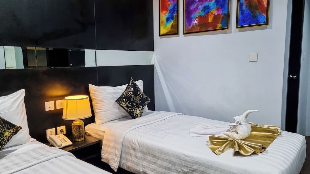 Hotel Rasamala Deluxe Twin Room 4