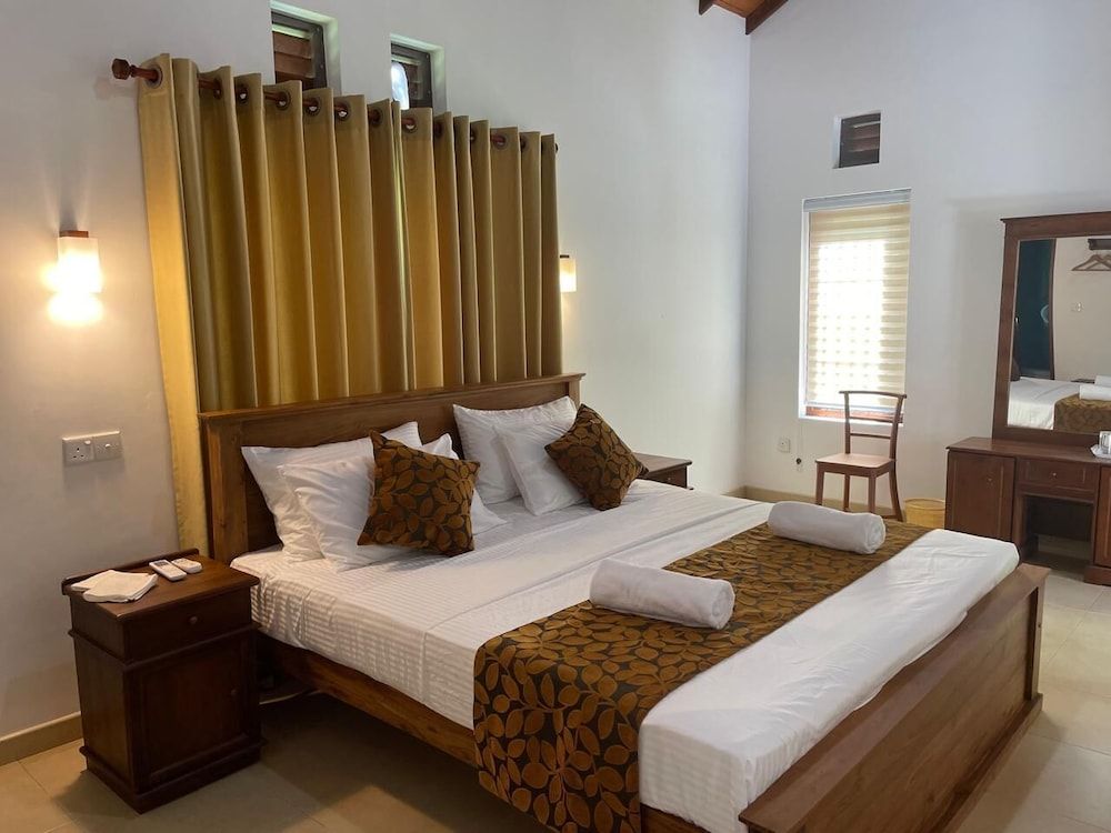 Standard Room, Multiple Beds, Balcony, Garden View