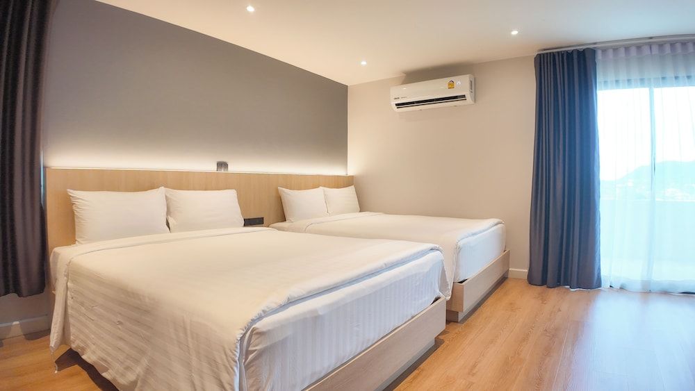 Family Quadruple Room, Patio, City View