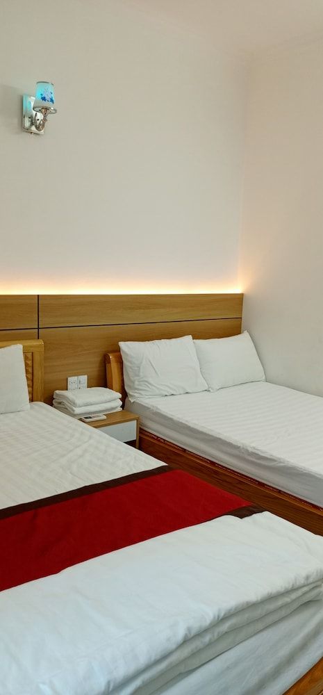 Heart Hotel MC Deluxe Triple Room 5