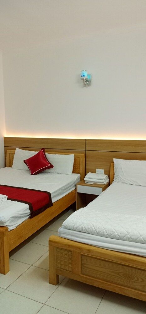 Heart Hotel MC Deluxe Triple Room 4