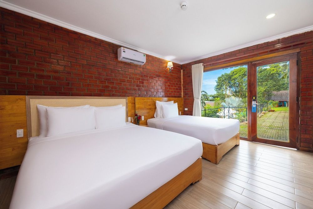 Siren Retreat Phu Quoc Deluxe Triple Room, Garden View