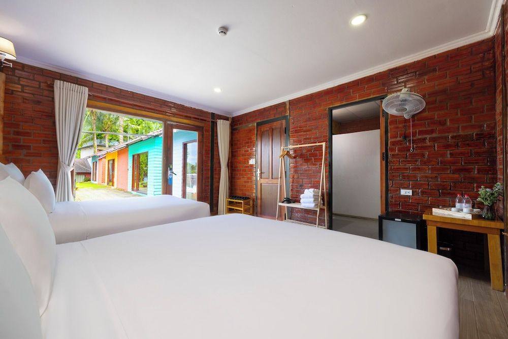 Siren Retreat Phu Quoc Deluxe Triple Room, Garden View 2