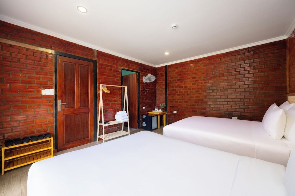 Siren Retreat Phu Quoc Deluxe Triple Room, Garden View 9