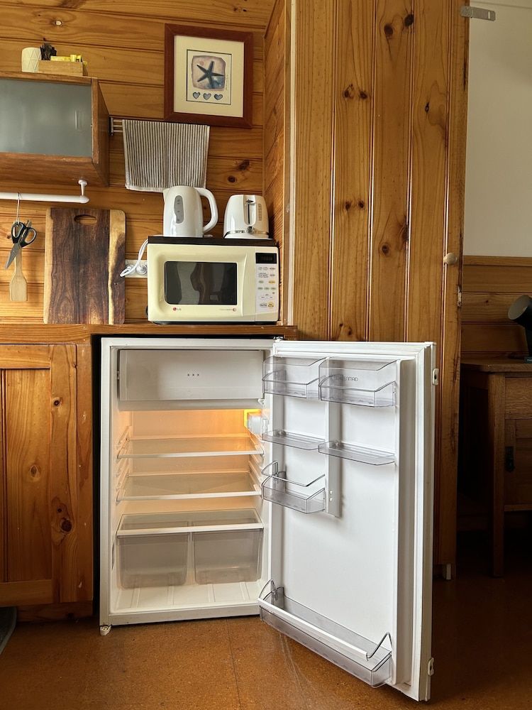 Clifton Beach Lodge Comfort Studio Suite, 1 Queen Bed, Non Smoking, Garden View 9