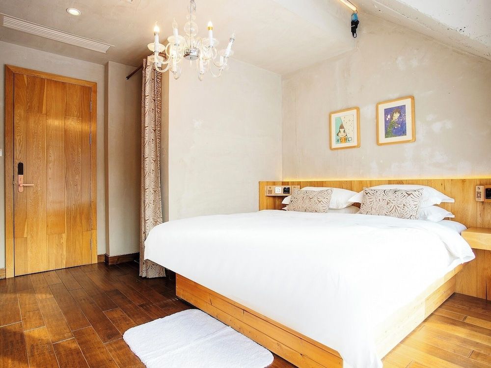 Shangzhi Qushe Resort Hotel Comfort Triple Room