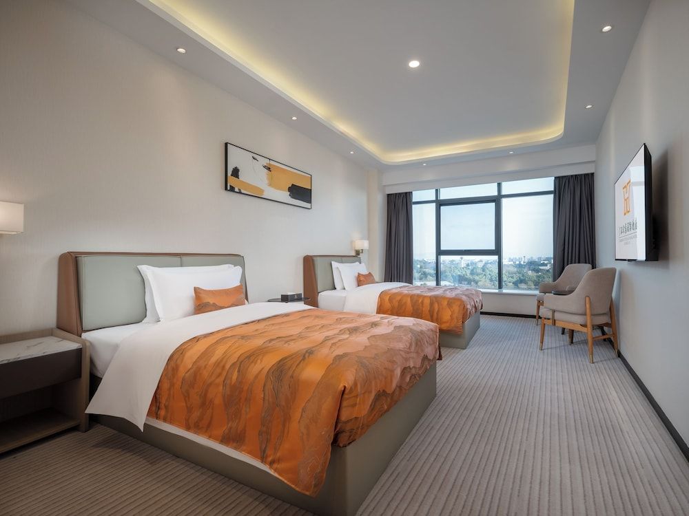 EXHIBTION INTERNATIONAL HOTEL GUANG HAN Executive Studio Suite, Park View