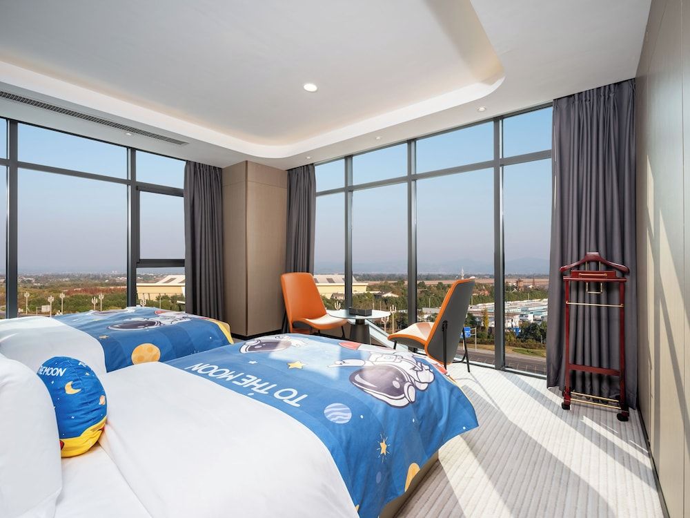 EXHIBTION INTERNATIONAL HOTEL GUANG HAN Family Studio Suite, Park View 5