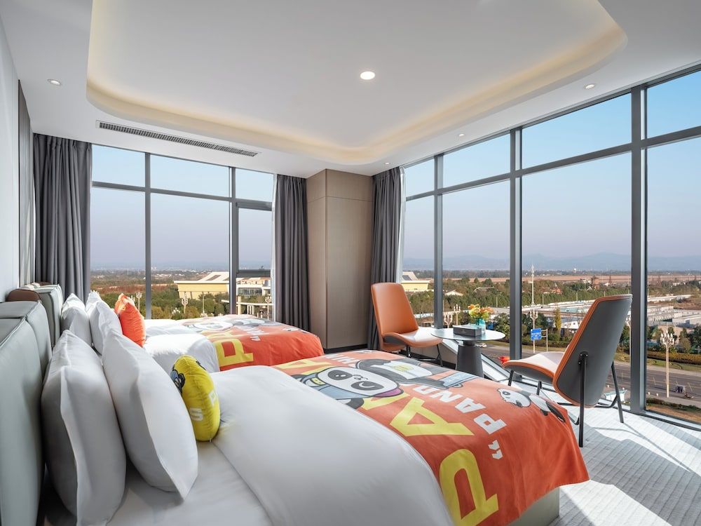 EXHIBTION INTERNATIONAL HOTEL GUANG HAN Family Studio Suite, Park View 7