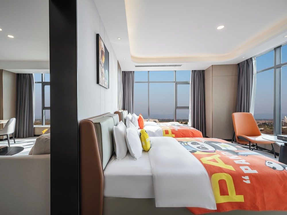 EXHIBTION INTERNATIONAL HOTEL GUANG HAN Family Studio Suite, Park View 6