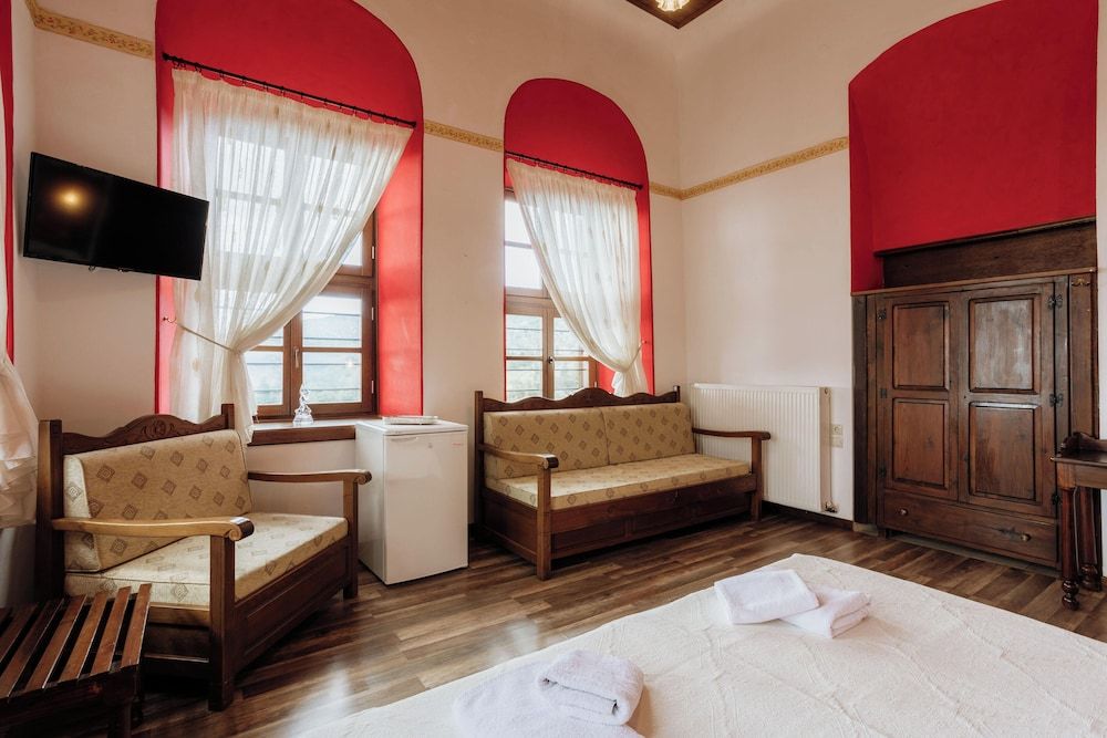King and Sofa Bed Room, City or Hill View