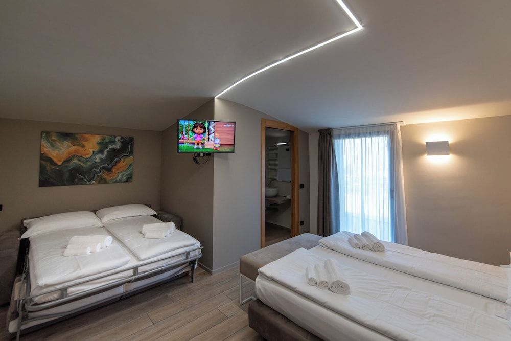 Ile Hotel Junior Suite Quadrupla con terrazzo