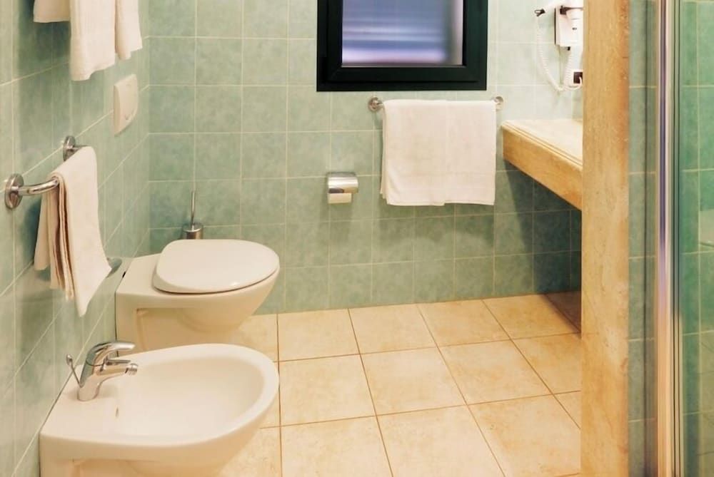 Hotiday Golfo Aranci Quadruple Room 3