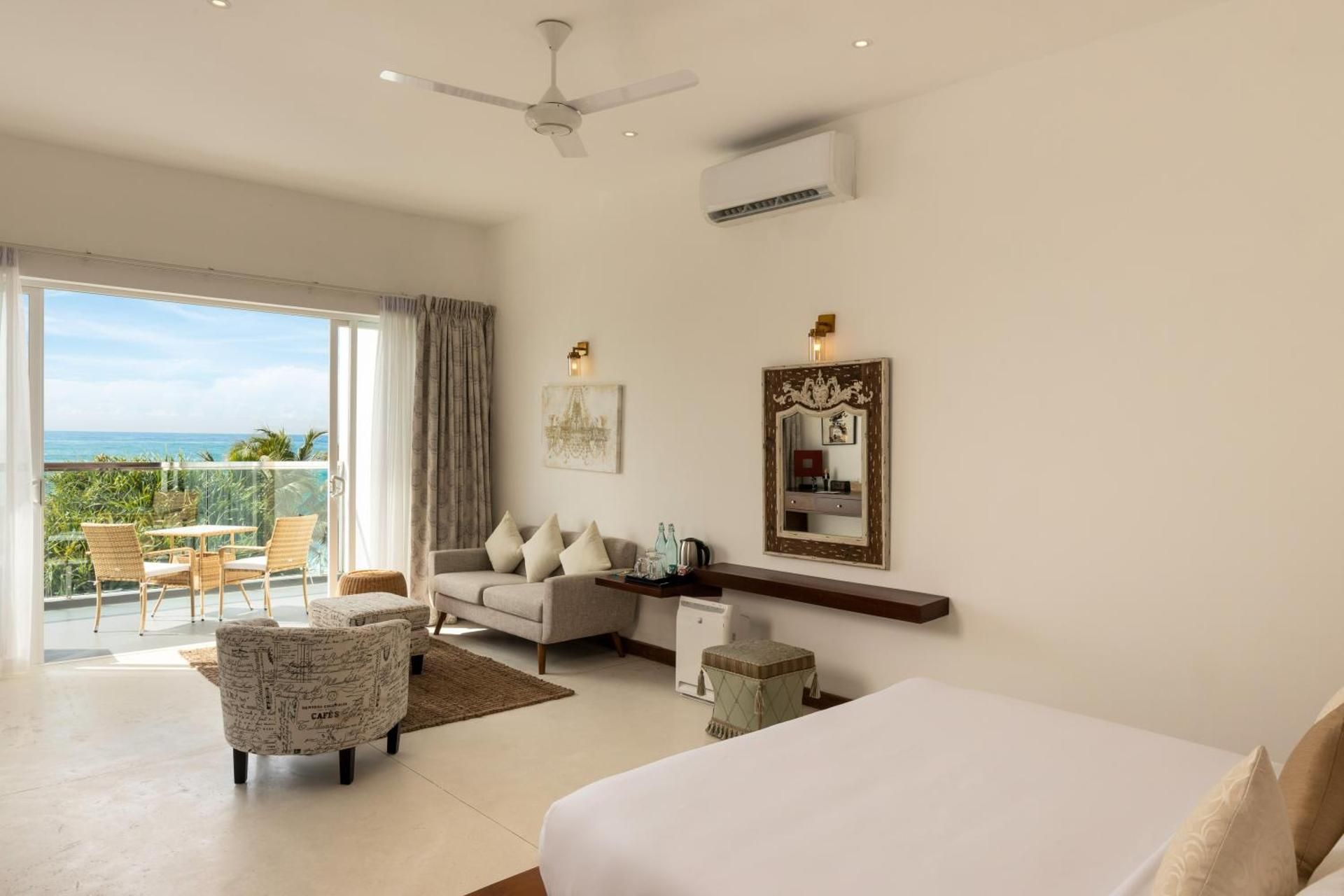 King Suite with Ocean View with homemade Sorbet, a tropical evening mocktail, local snacks with tea/coffee, and a dining experience by the white sands