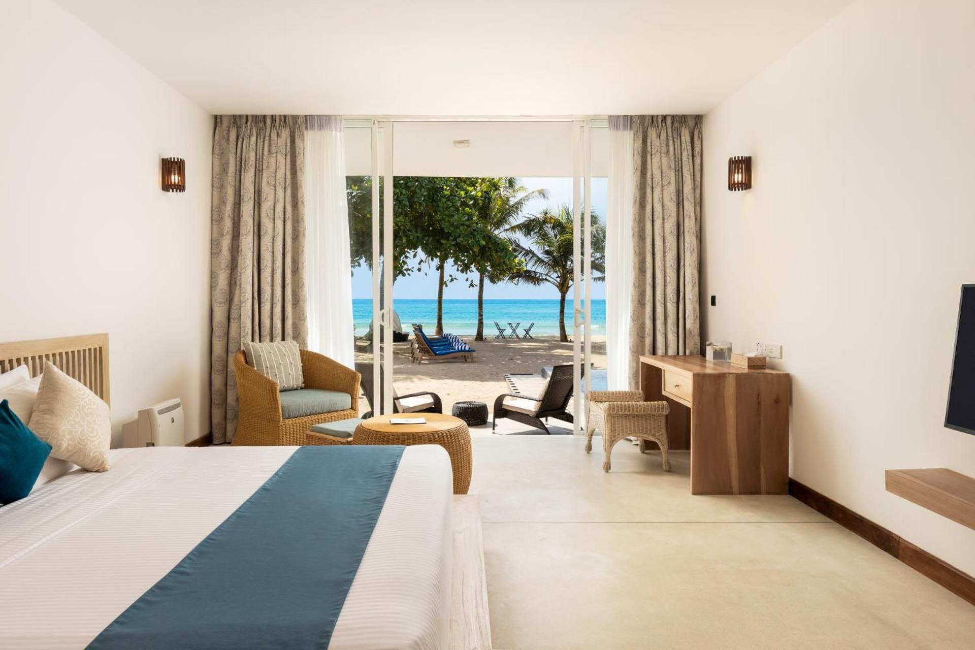Double Room with Terrace with homemade Sorbet, a tropical evening mocktail, local snacks with tea/coffee, and a dining experience by the white sands