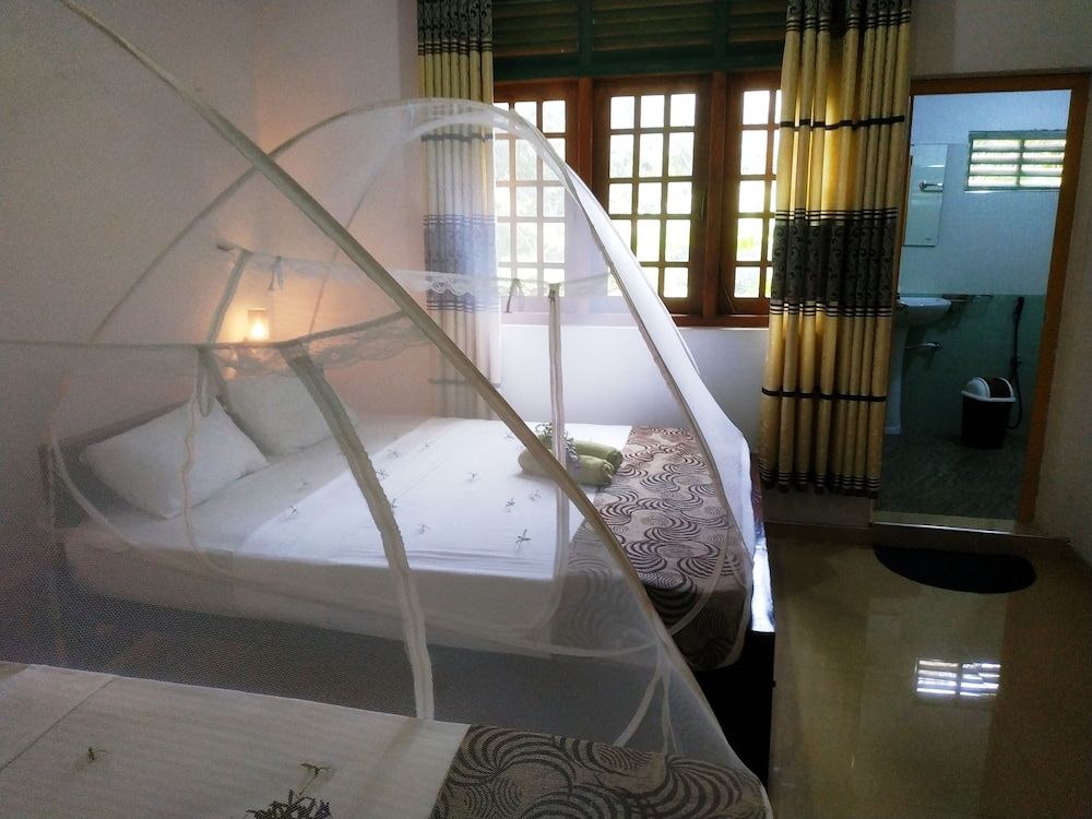 Green Heaven Safari Resort Udawalawa Family Quadruple Room, Balcony, Garden View 5