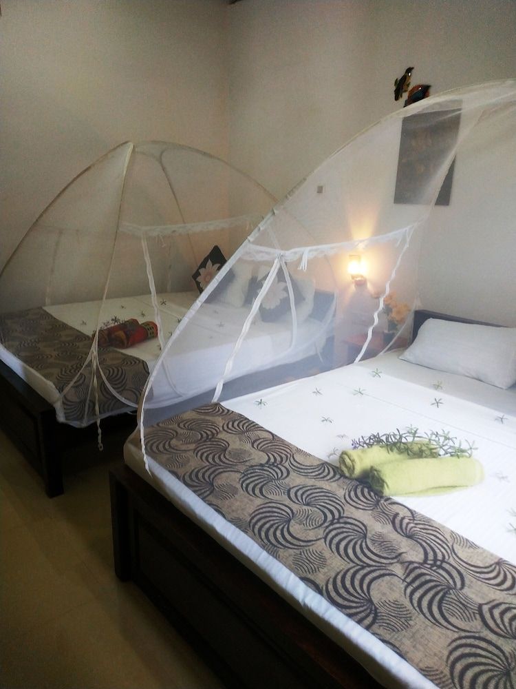 Green Heaven Safari Resort Udawalawa Family Quadruple Room, Balcony, Garden View 4