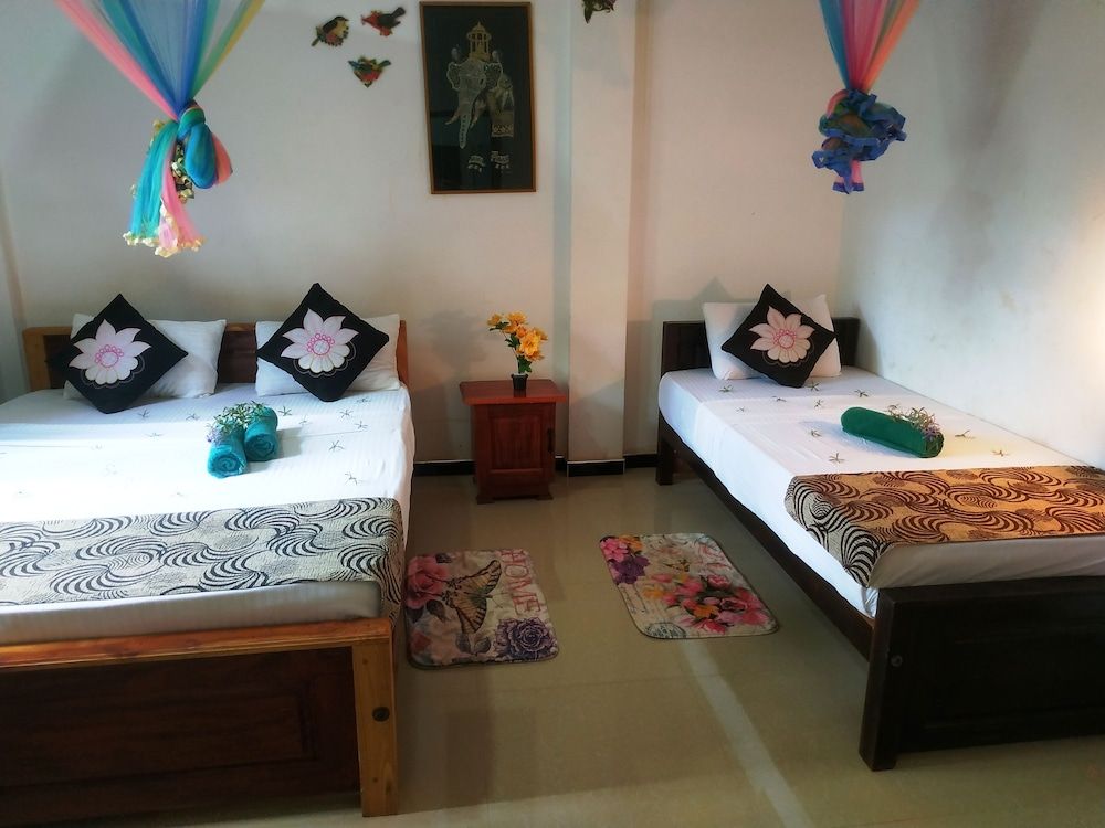 Green Heaven Safari Resort Udawalawa Family Quadruple Room, Balcony, Garden View 3