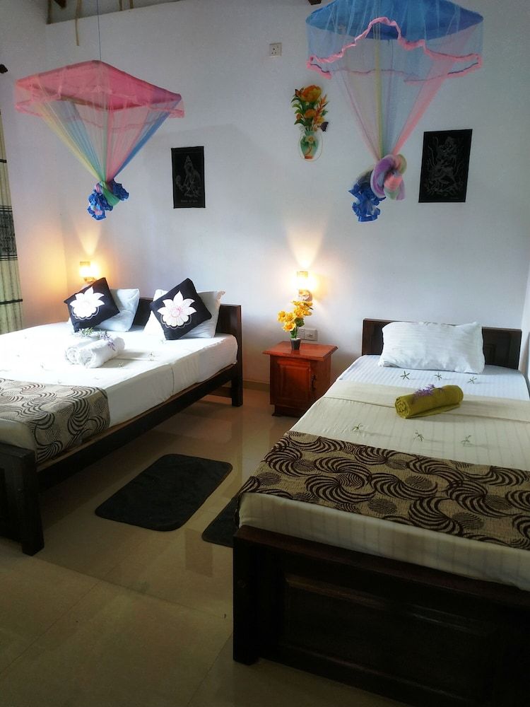 Green Heaven Safari Resort Udawalawa Family Quadruple Room, Balcony, Garden View 2