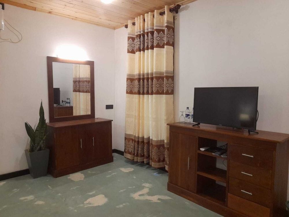 NATURALIZA Deluxe Double Room, Balcony, Garden View 12