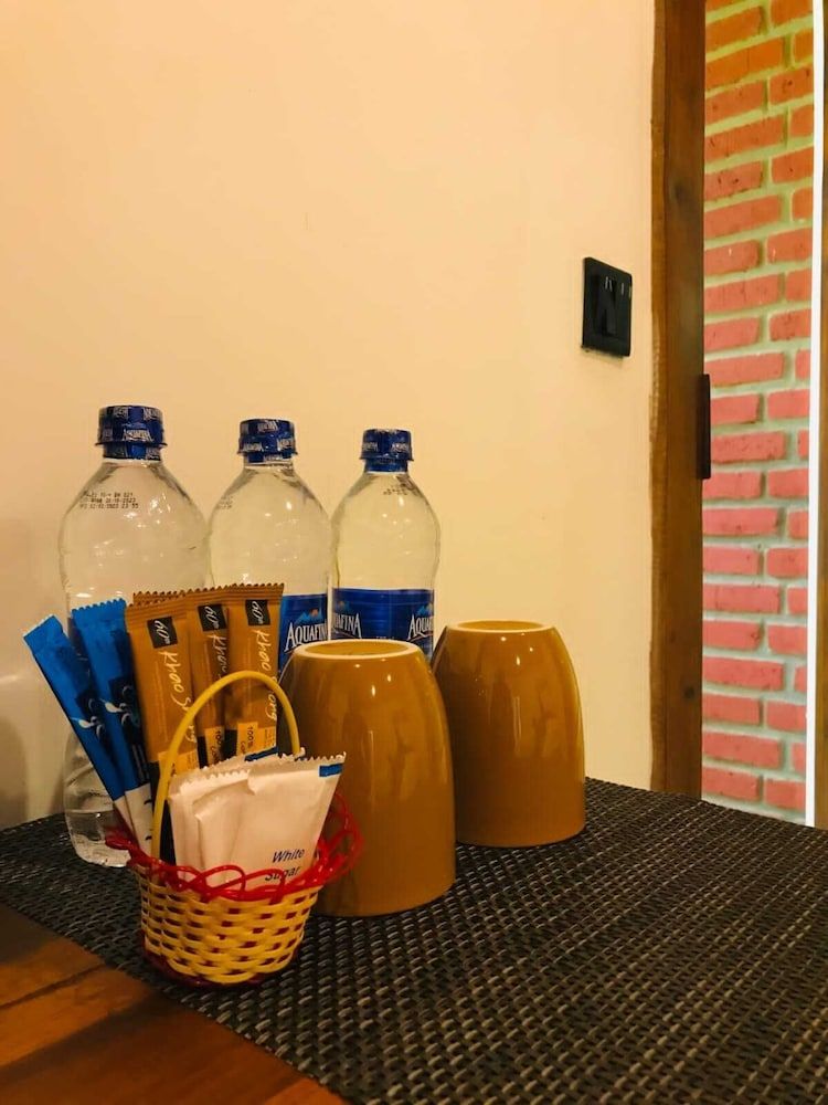 NATURALIZA Deluxe Double Room, Balcony, Garden View 13